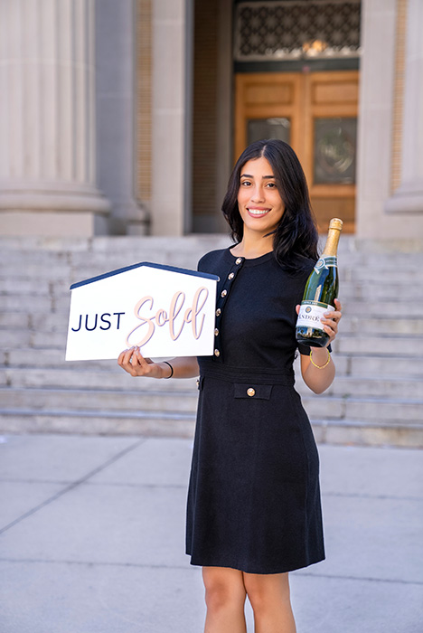 Melissa helping another buyer and seller close on a home sale.